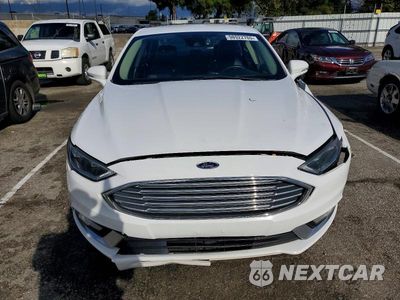 Piąte zdjęcie samochodu w środku: 2017 FORD FUSION SE HYBRID VIN:3FA6P0LU8HR408946 - miniatura