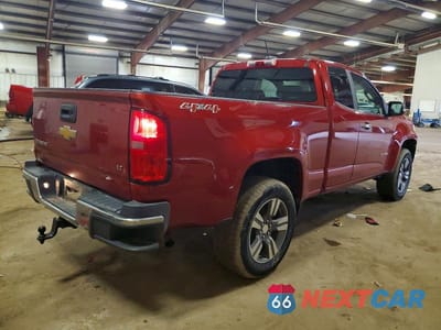 Trzecie zdjęcie samochodu z tyłu: 2015 CHEVROLET COLORADO LT VIN:1GCHTBEA1F1188120 - miniatura