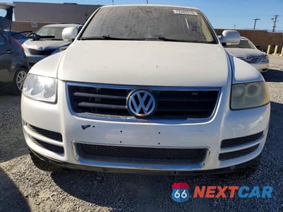 Piąte zdjęcie samochodu w środku: 2004 VOLKSWAGEN TOUAREG 4.2 VIN:WVGCM77L84D040508 - miniatura
