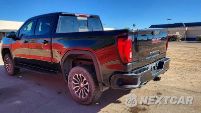 Trzecie zdjęcie samochodu z tyłu: 2021 GMC SIERRA K1500 AT4 VIN:1GTP9EEL6MZ286233 - miniatura