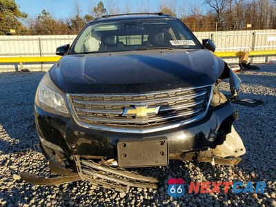 Piąte zdjęcie samochodu w środku: 2017 CHEVROLET TRAVERSE PREMIER VIN:1GNKRJKD4HJ171853 - miniatura