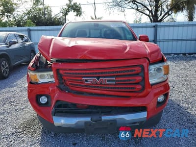 Piąte zdjęcie samochodu w środku: 2016 GMC CANYON SLE VIN:1GTG6CE33G1195565 - miniatura