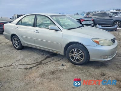 Czwarte zdjęcie samochodu z boku: 2002 TOYOTA CAMRY LE VIN:4T1BE32K92U601246 - miniatura