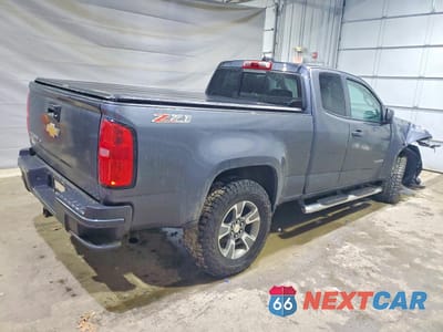 Trzecie zdjęcie samochodu z tyłu: 2017 CHEVROLET COLORADO Z71 VIN:1GCHTDENXH1262099 - miniatura