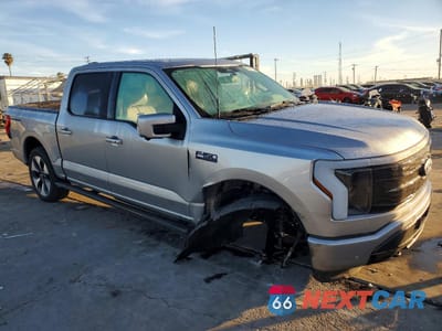 Czwarte zdjęcie samochodu z boku: 2024 FORD F150 LIGHTNING PLATINUM VIN:1FT6W7L70RWG01977 - miniatura
