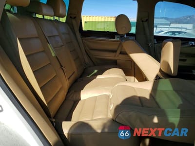 Zdjęcie 11 z 12 samochodu: 2004 VOLKSWAGEN TOUAREG 4.2 VIN:WVGCM77L84D040508 - miniatura