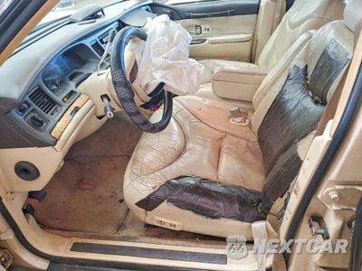 Zdjęcie 7 z 13 samochodu: 1996 LINCOLN TOWN CAR CARTIER VIN:1LNLM83W8TY616580 - miniatura