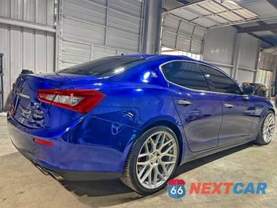 Czwarte zdjęcie samochodu z boku: 2014 MASERATI GHIBLI S VIN:ZAM57RTA0E1087454 - miniatura