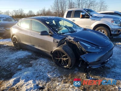 Czwarte zdjęcie samochodu z boku: 2023 TESLA MODEL 3 VIN:5YJ3E1EC5PF580557 - miniatura