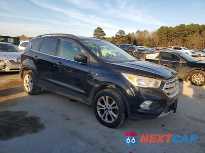 Czwarte zdjęcie samochodu z boku: 2018 FORD ESCAPE SE VIN:1FMCU0GD5JUA35455 - miniatura