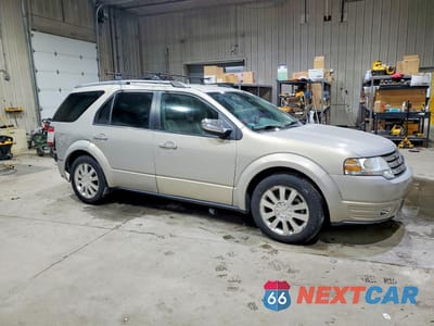 Czwarte zdjęcie samochodu z boku: 2009 FORD TAURUS X LIMITED VIN:1FMDK06WX9GA03124 - miniatura