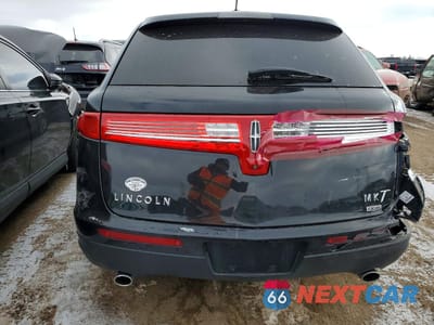Zdjęcie 6 z 12 samochodu: 2015 LINCOLN MKT VIN:2LMHJ5NK8FBL00125 - miniatura