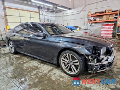 Czwarte zdjęcie samochodu z boku: 2017 BMW 750 XI VIN:WBA7F2C56HG422631 - miniatura