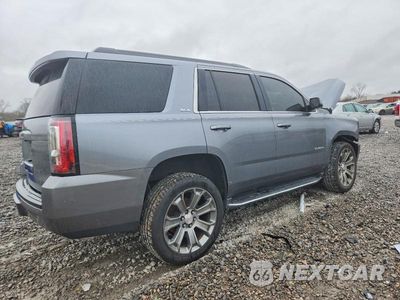 Trzecie zdjęcie samochodu z tyłu: 2019 GMC YUKON SLE VIN:1GKS1AKCXKR397562 - miniatura