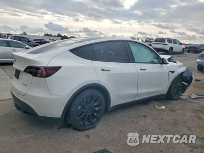 Trzecie zdjęcie samochodu z tyłu: 2022 TESLA MODEL Y VIN:7SAYGAEE3NF306923 - miniatura