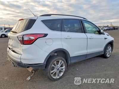 Trzecie zdjęcie samochodu z tyłu: 2018 FORD ESCAPE SE VIN:1FMCU9GD6JUC63128 - miniatura