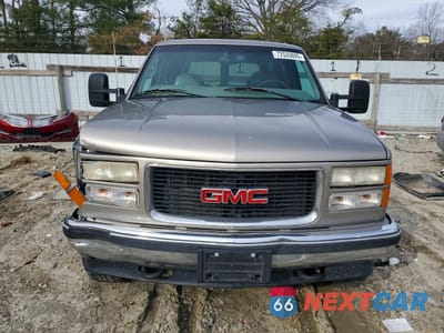 Piąte zdjęcie samochodu w środku: 1999 GMC YUKON VIN:1GKEK13R2XR501899 - miniatura