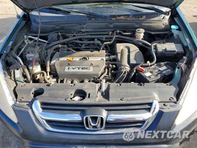 Zdjęcie 12 z 15 samochodu: 2002 HONDA CR-V EX VIN:JHLRD788X2C016659 - miniatura