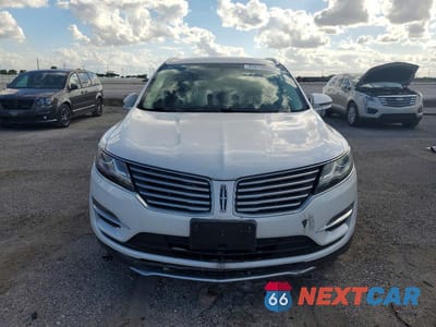 Piąte zdjęcie samochodu w środku: 2015 LINCOLN MKC VIN:5LMCJ1A94FUJ19967 - miniatura