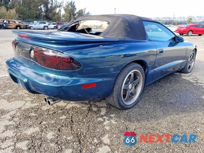 Trzecie zdjęcie samochodu z tyłu: 1997 PONTIAC GRAND AM VIN:2G2FV32P4V2205385 - miniatura