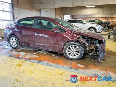 Czwarte zdjęcie samochodu z boku: 2017 KIA FORTE LX VIN:3KPFL4A74HE132234 - miniatura