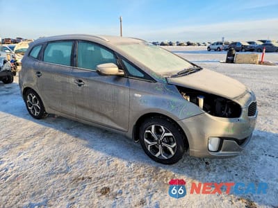 Czwarte zdjęcie samochodu z boku: 2014 KIA RONDO VIN:KNAHT8A32E7047799 - miniatura