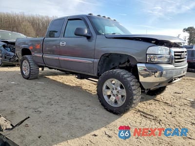 Czwarte zdjęcie samochodu z boku: 2000 GMC NEW SIERRA K1500 VIN:1GTEK19TXYZ266006 - miniatura