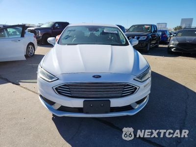 Piąte zdjęcie samochodu w środku: 2018 FORD FUSION SE HYBRID VIN:3FA6P0LUXJR278691 - miniatura
