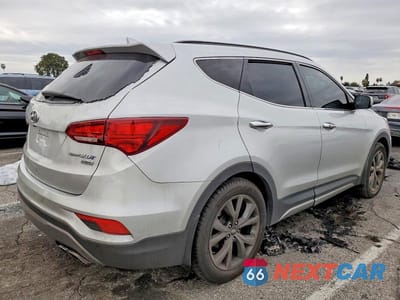 Trzecie zdjęcie samochodu z tyłu: 2018 HYUNDAI SANTA FE SPORT 2.0T ULTIMATE VIN:5XYZW4LA5JG522832 - miniatura