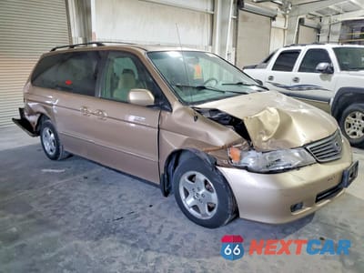 Czwarte zdjęcie samochodu z boku: 2000 HONDA ODYSSEY EX VIN:2HKRL1870YH512216 - miniatura