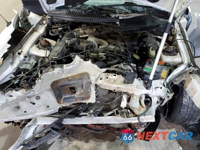 Zdjęcie 11 z 12 samochodu: 2000 FORD MUSTANG VIN:1FAFP4447YF215836 - miniatura