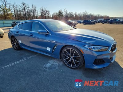 Czwarte zdjęcie samochodu z boku: 2021 BMW M850XI VIN:WBAGV8C04MCF86667 - miniatura