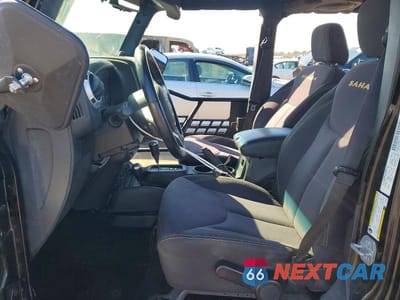 Zdjęcie 7 z 11 samochodu: 2014 JEEP WRANGLER UNLIMITED SAHARA VIN:1C4BJWEG1EL210563 - miniatura