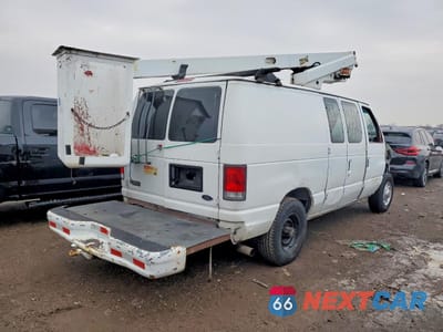 Trzecie zdjęcie samochodu z tyłu: 2000 FORD ECONOLINE E350 SUPER DUTY VAN VIN:1FTSE34LXYHA40793 - miniatura