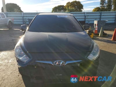 Piąte zdjęcie samochodu w środku: 2013 HYUNDAI ACCENT GLS VIN:KMHCT4AE8DU338195 - miniatura