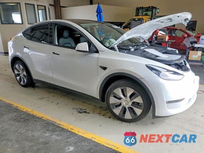 Czwarte zdjęcie samochodu z boku: 2022 TESLA MODEL Y VIN:7SAYGDEE8NF504530 - miniatura