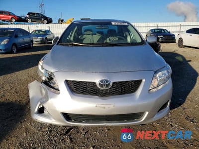 Piąte zdjęcie samochodu w środku: 2009 TOYOTA COROLLA VIN:1NXBU40E49Z117050 - miniatura