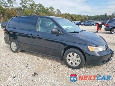 Czwarte zdjęcie samochodu z boku: 2003 HONDA ODYSSEY EXL VIN:5FNRL18093B044173 - miniatura
