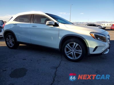 Czwarte zdjęcie samochodu z boku: 2017 MERCEDES-BENZ GLA 250 VIN:WDCTG4EB5HJ319453 - miniatura