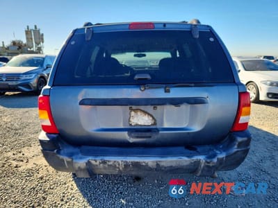 Zdjęcie 6 z 12 samochodu: 2001 JEEP GRAND CHEROKEE LAREDO VIN:1J4GW48S91C671624 - miniatura