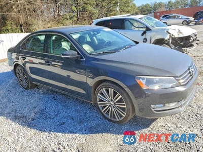 Czwarte zdjęcie samochodu z boku: 2015 VOLKSWAGEN PASSAT SE VIN:1VWBT7A34FC094535 - miniatura