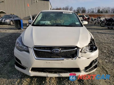 Piąte zdjęcie samochodu w środku: 2016 SUBARU IMPREZA PREMIUM VIN:JF1GPAB62G8311352 - miniatura