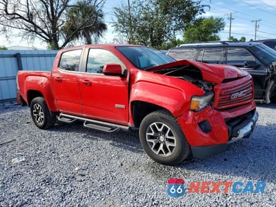 Czwarte zdjęcie samochodu z boku: 2016 GMC CANYON SLE VIN:1GTG6CE33G1195565 - miniatura