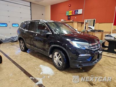 Czwarte zdjęcie samochodu z boku: 2017 HONDA PILOT EXL VIN:5FNYF6H88HB004258 - miniatura