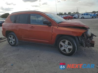 Czwarte zdjęcie samochodu z boku: 2010 JEEP COMPASS SPORT VIN:1J4NT4FB1AD612046 - miniatura
