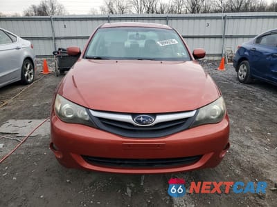 Piąte zdjęcie samochodu w środku: 2010 SUBARU IMPREZA 2.5I PREMIUM VIN:JF1GE6B62AH506958 - miniatura