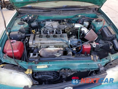Zdjęcie 11 z 12 samochodu: 1997 TOYOTA COROLLA DX VIN:1NXBB02E2VZ505125 - miniatura