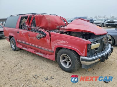 Czwarte zdjęcie samochodu z boku: 1993 CHEVROLET SUBURBAN C1500 VIN:1GNEC16K6PJ304389 - miniatura