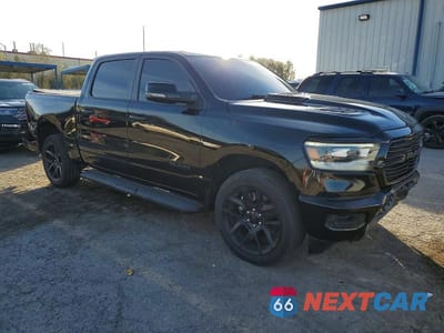 Czwarte zdjęcie samochodu z boku: 2023 RAM 1500 LARAMIE VIN:1C6SRFJM0PN556185 - miniatura
