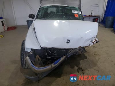 Piąte zdjęcie samochodu w środku: 2004 DODGE DAKOTA QUAD SLT VIN:1D7HG48N44S692060 - miniatura